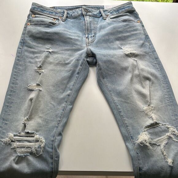 NWT American Eagle Airflex + Stacked Skinny Destroyed Light Wash Jeans 34/39.5 - Picture 3 of 10